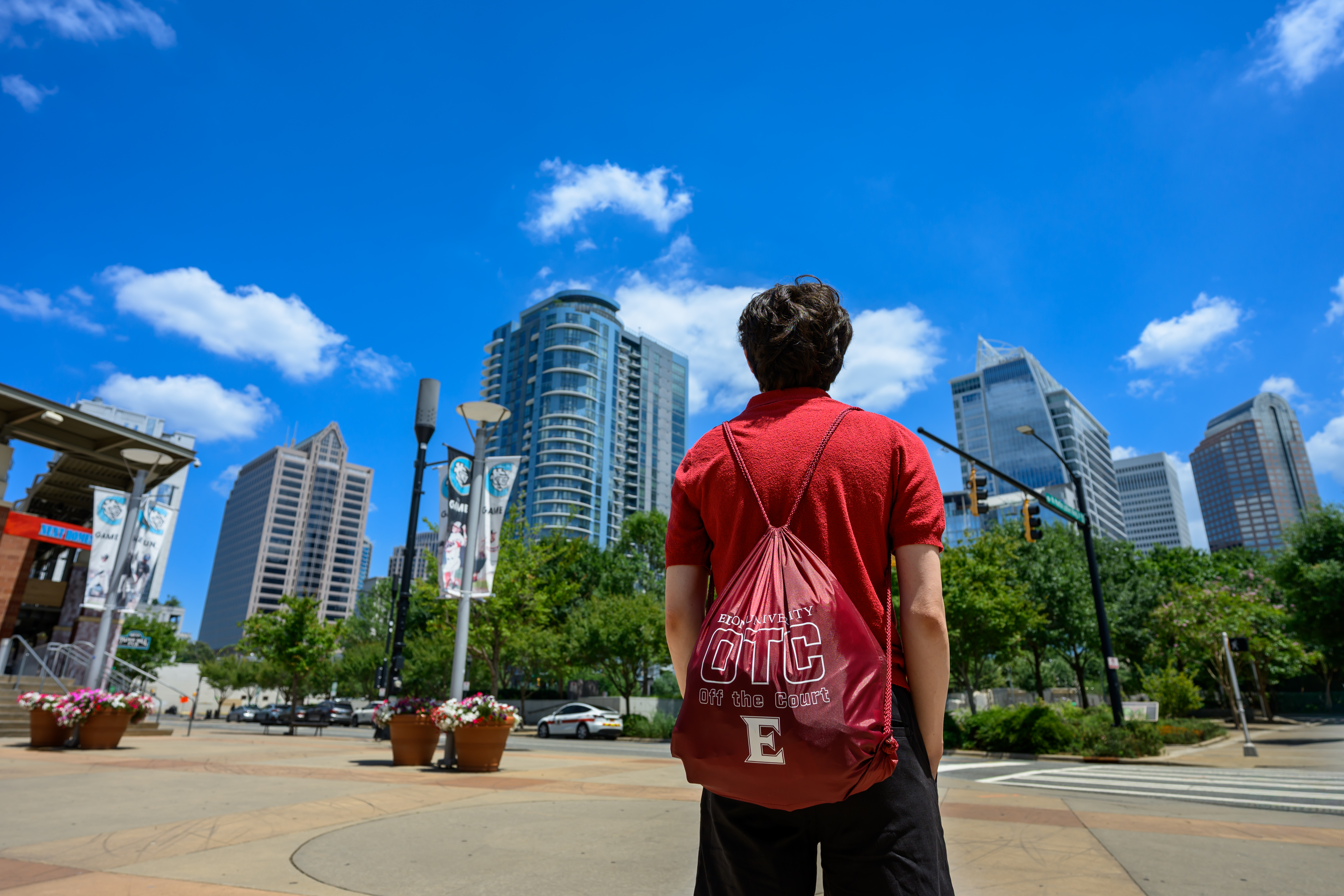 An 51������ Off the Court participant stands in uptown Charlotte, North Carolina, overlooking the city skyline during a summer professional development experience.