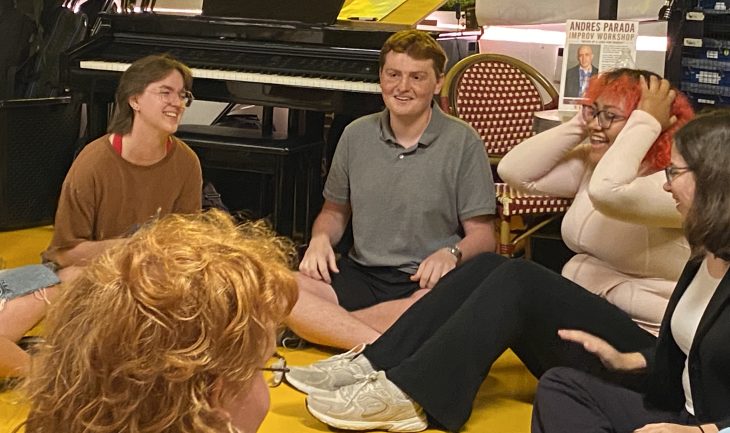 Students sit in a circle during a small-group discussion at Elon Los Angeles, participating in an interactive activity that encourages conversation, collaboration and relationship-building.