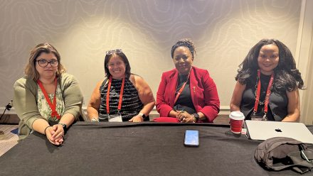 Vanessa Bravo speaks during an AEJMC teaching panel alongside Maria De Moya, Carolyn Walcott and Mia Moody.