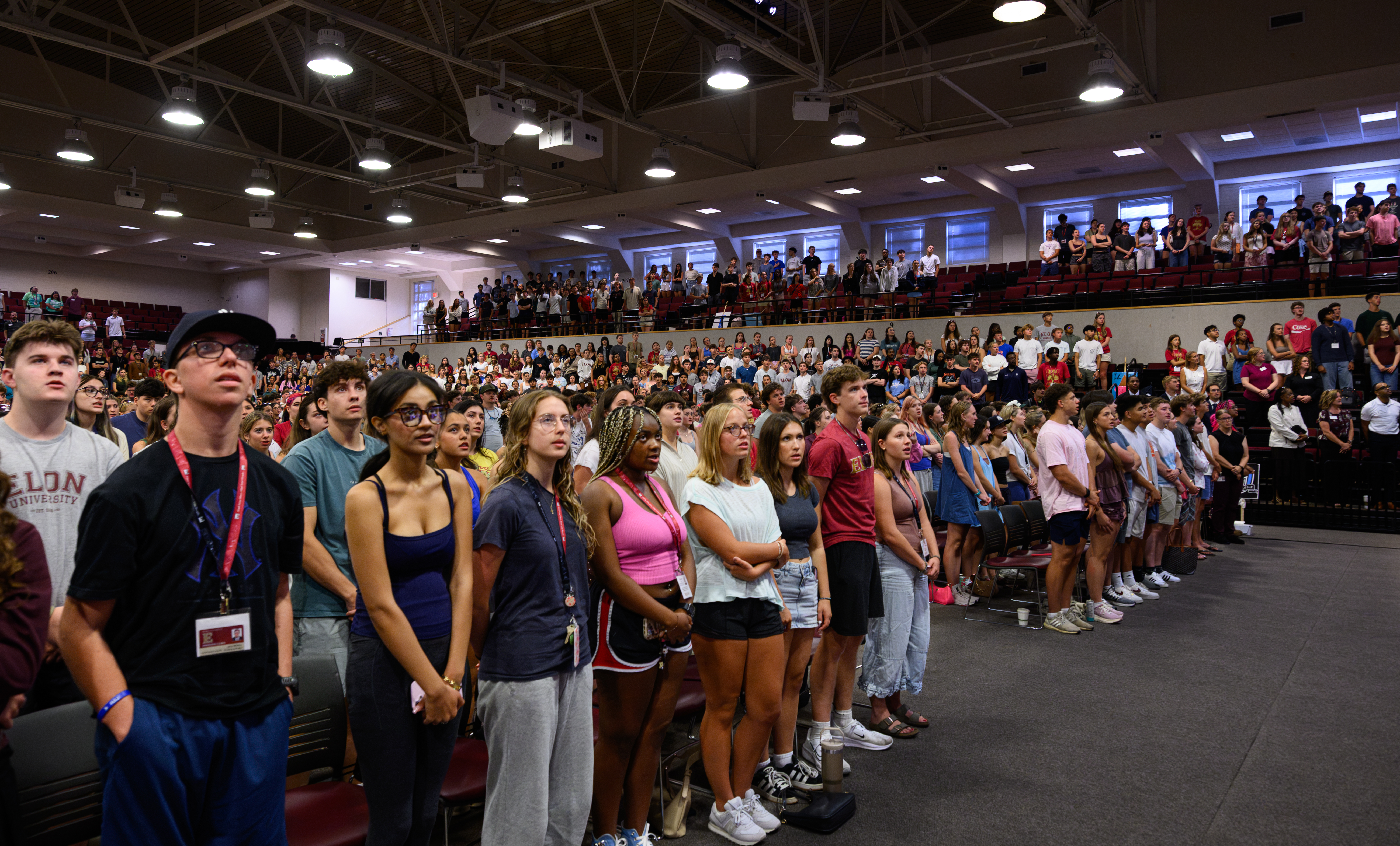 Students stand in rows during the Call to Honor ceremony