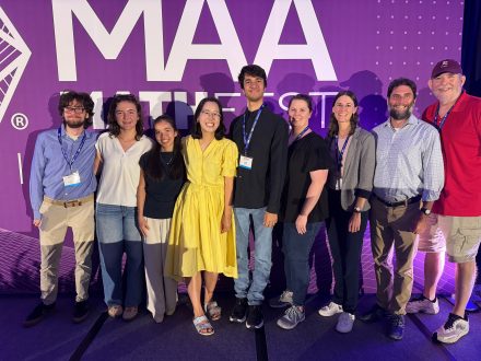 Hwayeon Ryu standing with Elon faculty and students who attended the MathFest.