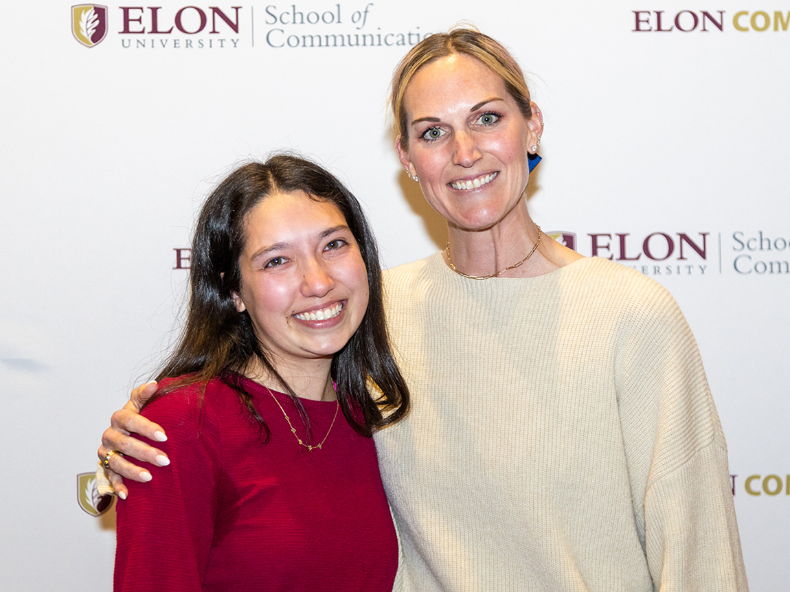 Brynja Burton stands with Elon professor Shaina Dabbs