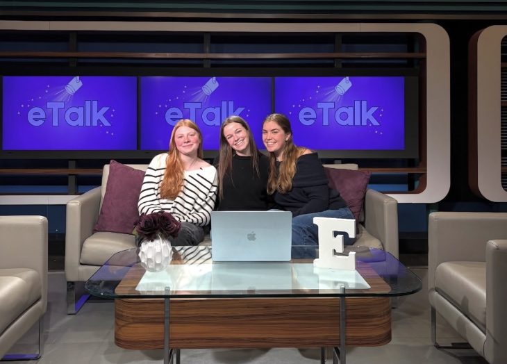 Lilly Galvin ’27, ESTV station manager, sits alongside two ESTV anchors during the talk show “eTalk.”