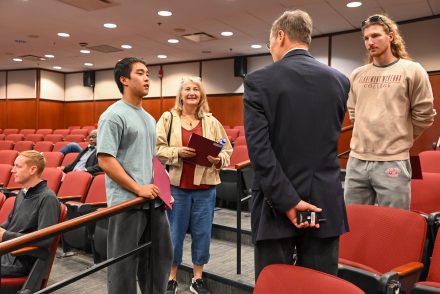Family Entrepreneurship Forum attendees talk together in LaRose Digital Theatre