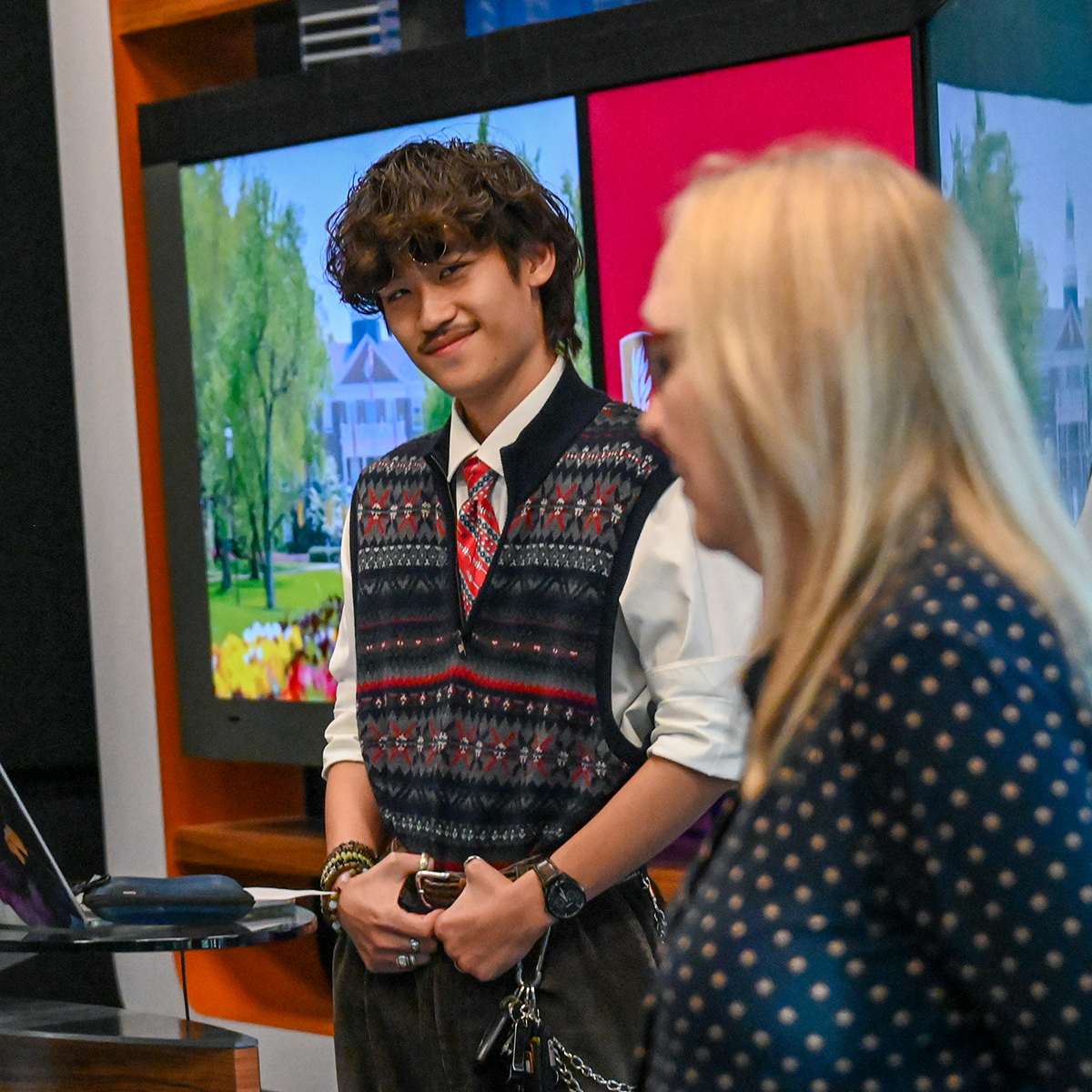 Ethan Wu ’27 looks toward Assistant Professor of Journalism Lorraine Ahearn