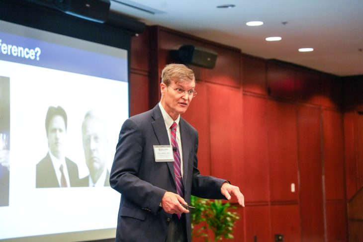 Steve Miller speaks and gestures during his presentation.