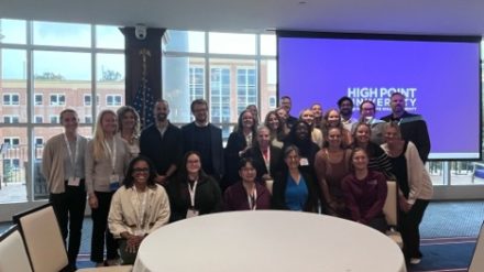 Conference attendees posing for a picture