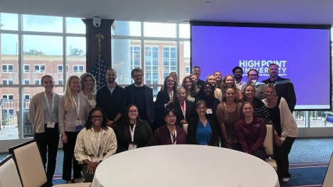 Conference attendees posing for a picture