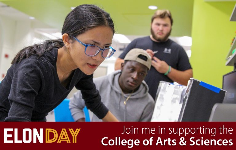 Professor and students looking at a computer - Elon Day - Join me in supporting the College of Arts & Sciences