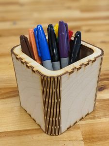 Laser cut cup holding sharpies