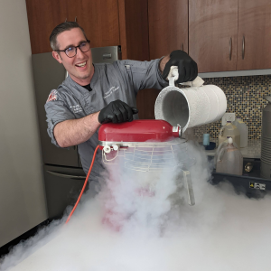 Staff pouring liquid nitrogen into a mixer