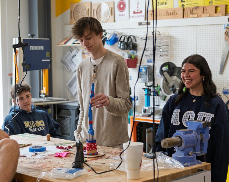 Students showing their first prototype of their project