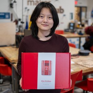 Carina holding a Kickbox