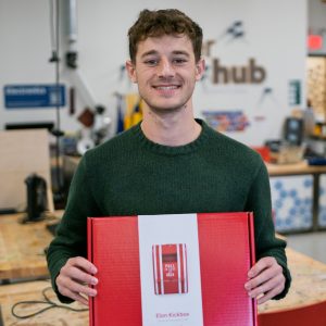 Joseph holding a Kickbox