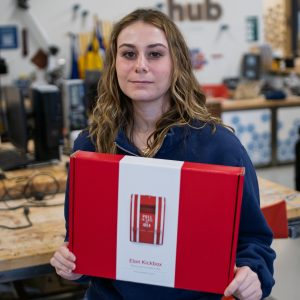 Rebecca holding a Kickbox