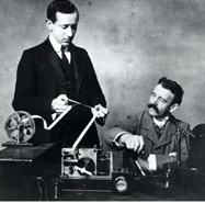 Two Men Using the Telegraph Machine 