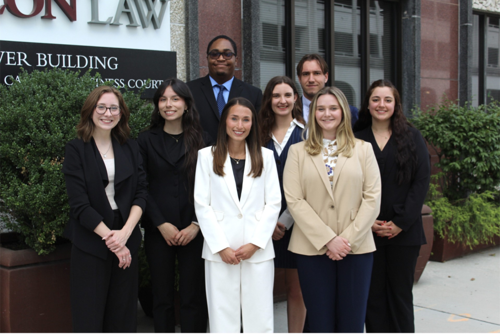 members of the Fellowship of Christian Lawyers in front of Elon Law's building