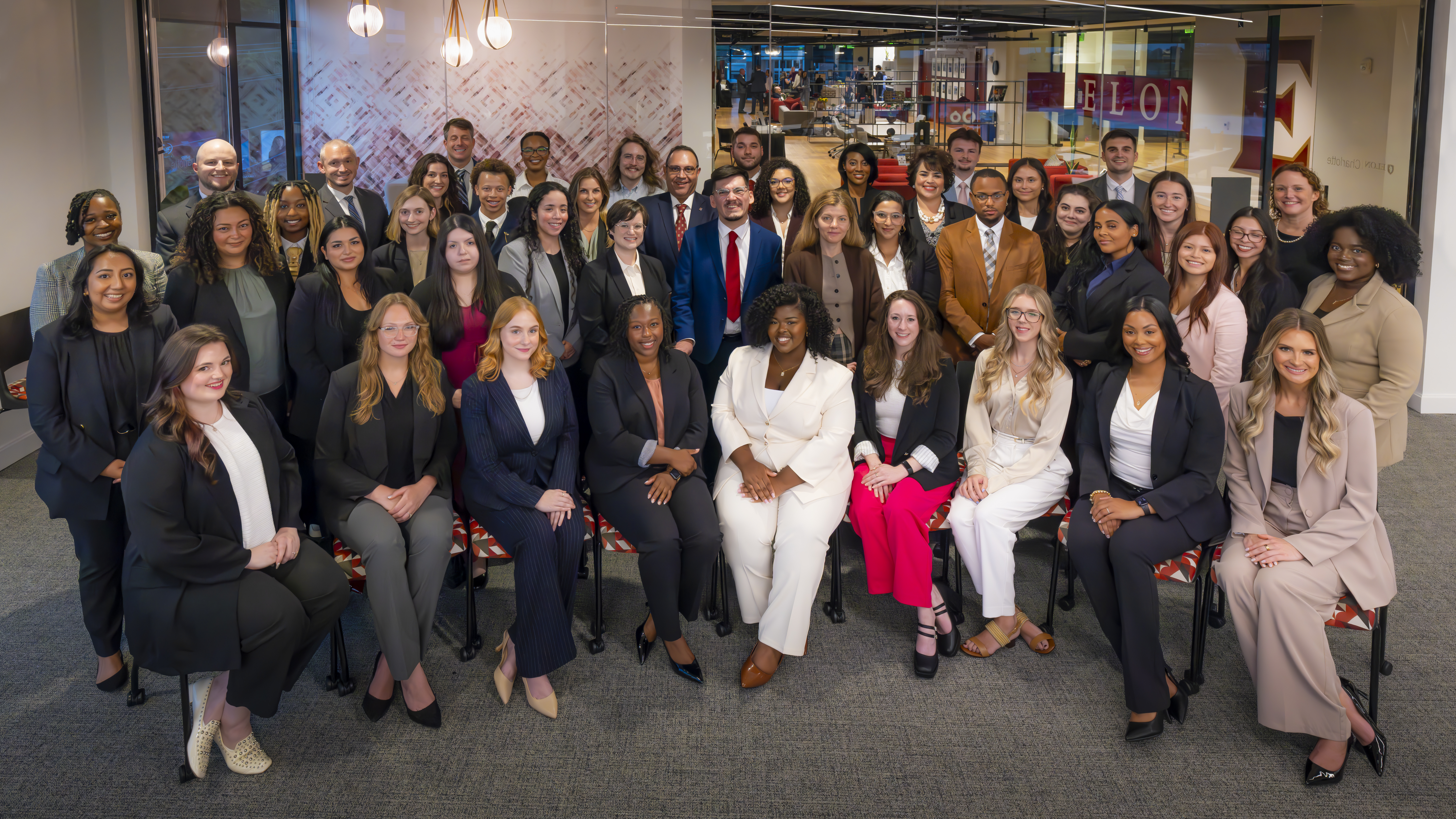46 students in a group photo inside Elon University's Charlotte center. Elon Law's Flex Program allows you to attend law school in Charlotte part-time and in-person.