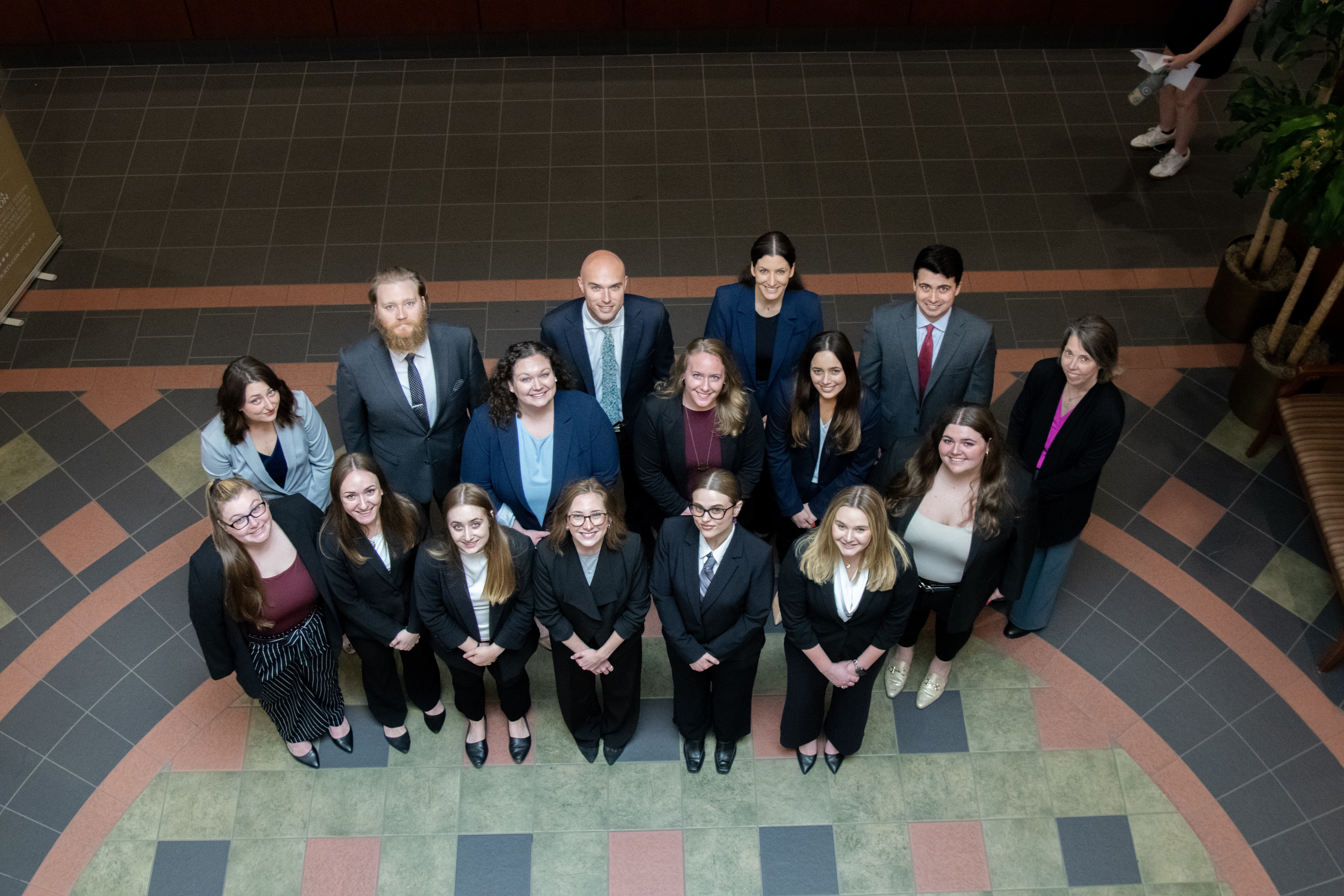 Elon Law Review members shown from above in Elon Law's lobby.